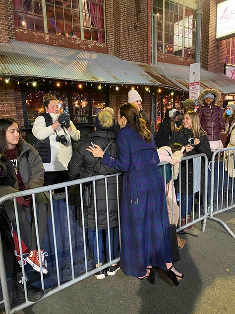 Three shots of Elizabeth meeting SMT community members in Boston.