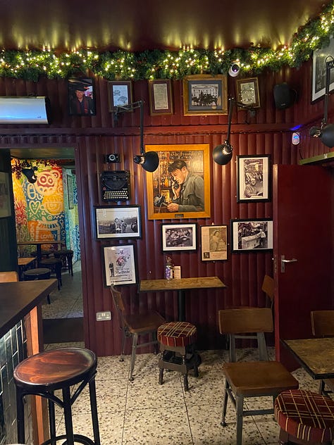 An Irish pub, interior, with news decor and playing cards.