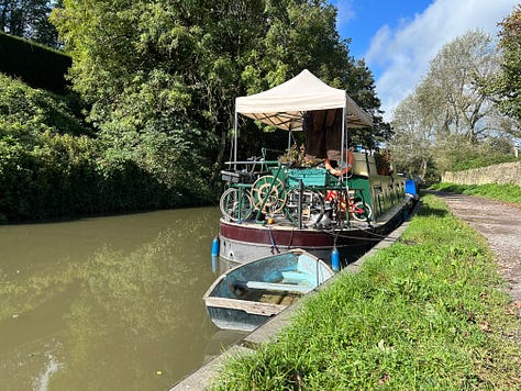 A lock with narrowboat on the Kennet and Avon Canal, Bradford on Avon. Another narrowboat moored on the bank. Images: Roland’s Travels 