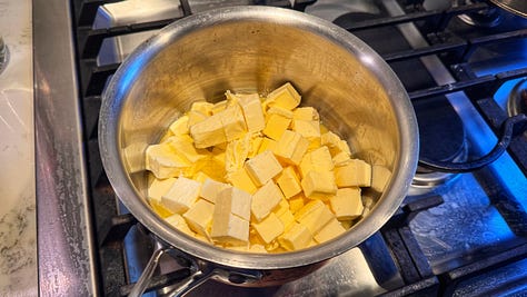 Three photos of a pot of butter cubes as they melt
