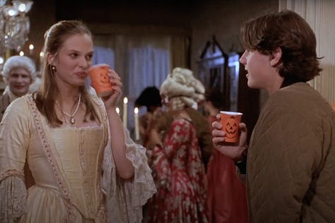 In Hocus Pocus (1993), Max and Dani trick or treat at Alison's house and drink cider against a backdrop of a Halloween costume party and candy