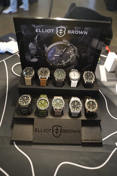 Beachmaster on wrist, with Gem holding a coctail, a display of the watch models made by EB, and a black PVD coated Arne