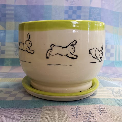 planters with bunnies pained on the sides