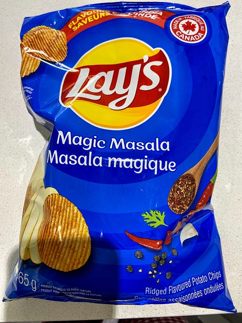 Left: Lays Cucumber flavor potato chip bag; Middle: Lays Roasted Garlic Oyster flavor potato chip bag; Right: Lays Magic Masala chip bag