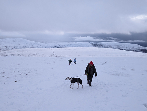 Sunset walk on Pen y Fan in winter with snow 