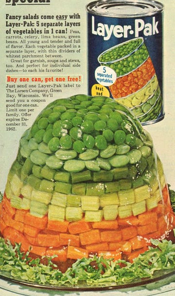 Image of a Perfection salad tower of gelatin, a ring of green tuna and lime gelatin salad, and 4 mini towers of congealed barbecue sauce