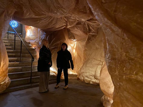 A large underground crypt transformed into an organ of healing via installation of waxed kraft paper environment and performances held in the space. 