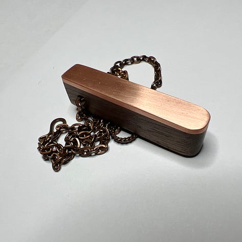 Pictures of wooden and metal pendants