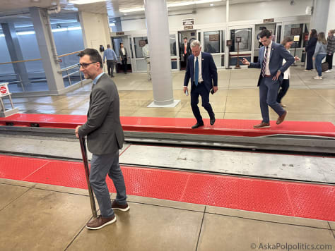 Sen. Tommy Tuberville catches Senate tram.