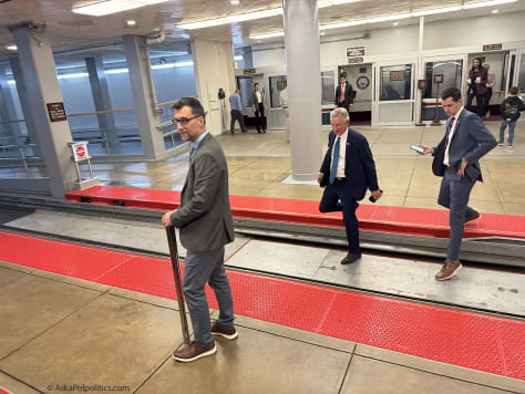 Sen. Tommy Tuberville catches Senate tram.