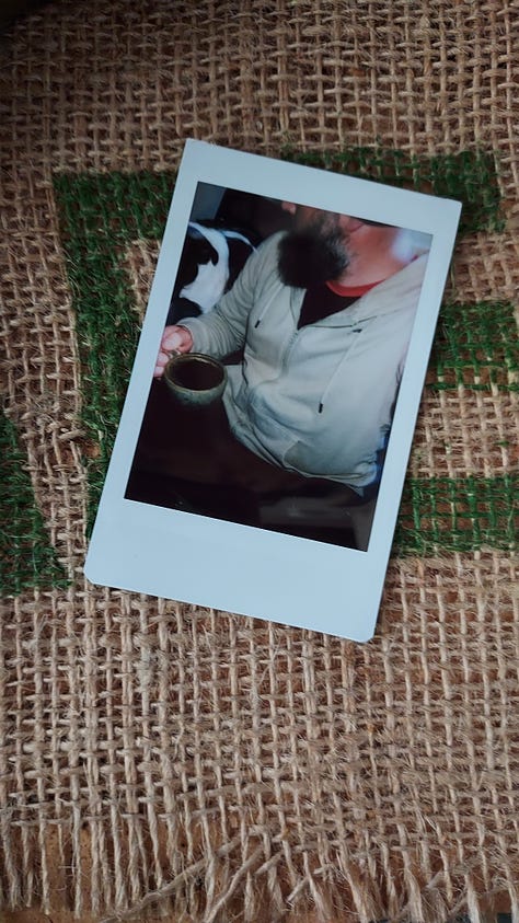 A collage of instant photographs of coffee mugs or a white, bald, bearded man drinking coffee