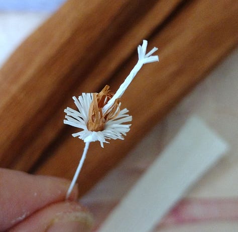 Close up images of the many little parts which make the oversized paper model of the heather 'Ling'