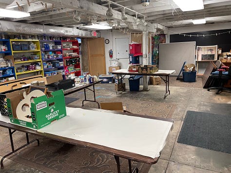 Empty tables, tubs filled with leftover materials, canvases tagged for donation to the high school art program, and 37 votes to keep going and hold the swap again.