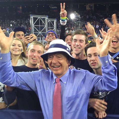 Images from the 2016 Final Four: Dick Vitale pregame with the Villanova student section; the Wildcats reacting to Kris Jenkins' 3-pointer during "One Shining Moment; and Daniel Ochefu holding up the trophy.