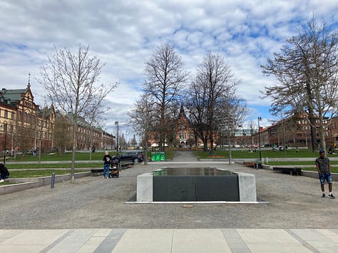 City hall park is a wide open space with interesting architecture around