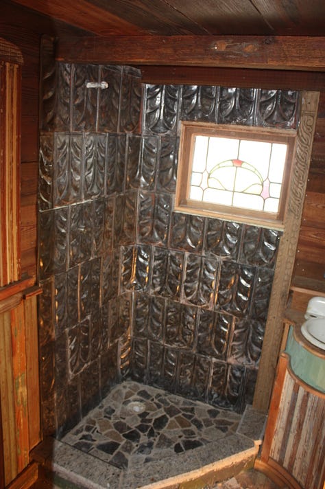 How about some roofing shingles 125 years old, or a cast iron sink as old or older. Perhaps the hand laid shower floor with granite, marbles, even more. A sink cabinet like few will see? A stained glass window to the inside for mii.