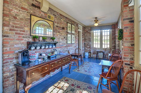 a wedding venue, seating near a fireplace, a cottage, a veranda, a bedroom