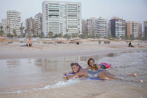 Aline Deschamps' photos of exploited African women enjoying a moment of freedom at the beach in Beirut.