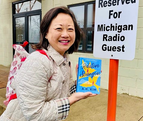 Author A.H. Kim and her two novels, A Good Family and Relative Strangers.