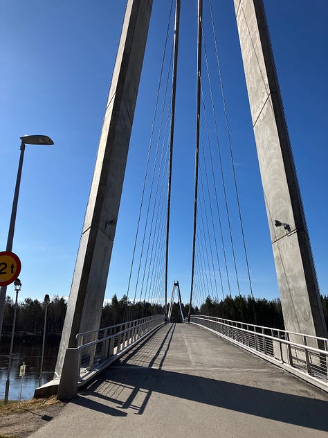 Low bridge at the start, suspension bridge takes you to the island