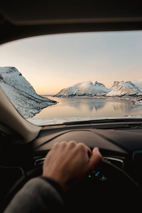 Images showing the drive from the island of Senja to Lofoten Islands in Norway. Winter landscape as seen from a Norwegian road