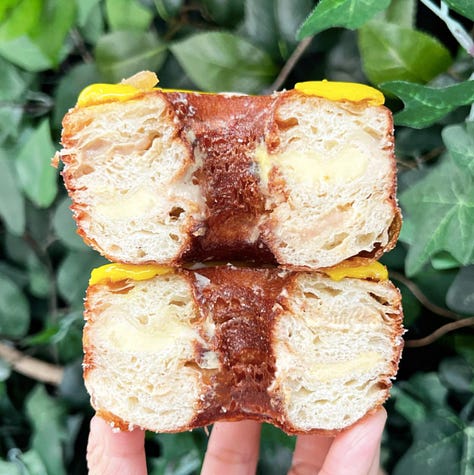 Image 1: photo via official Cronut®️ chef @dominiqueansel Instagram showcasing their monthly March Cronut®️ (Lemon Curd & Graham Cracker). Images 2 & 3: "Le Stan", Chicago's take on the doughnut/croissant remix (photos by Jolene Handy) 