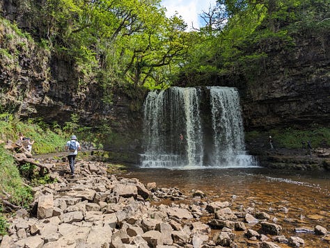 images of waterfalls in sunshine in the brecon beacons