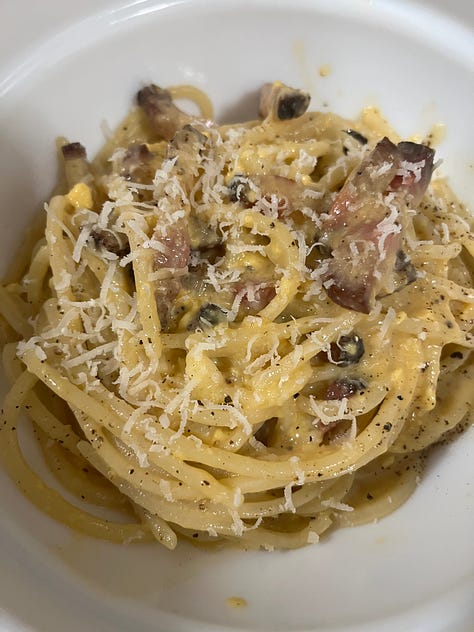 three bowls of carbonara.