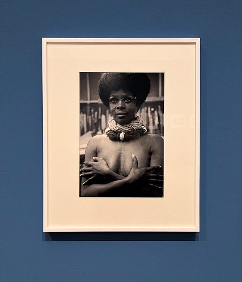 Una delle opere di Jr, l'ingresso di Camera Torino e una delle foto di Eve Arnold in esposizione