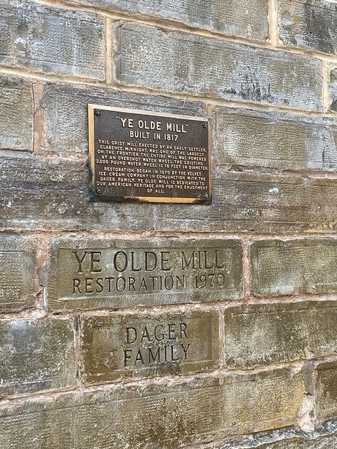 Pictures I took when I last visited Ye Old Mill in Utica, Ohio. One is a marker indicating the history of the site, and I am pictured below the sign with a friend