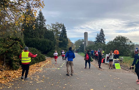 A banner marks the finish, off to one side of the path