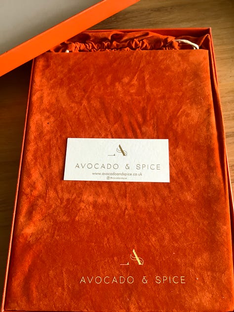 Orange notebook with velvet bag and box ready for writing poems into