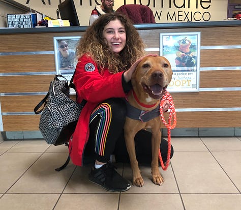 women with dogs they've just adopted