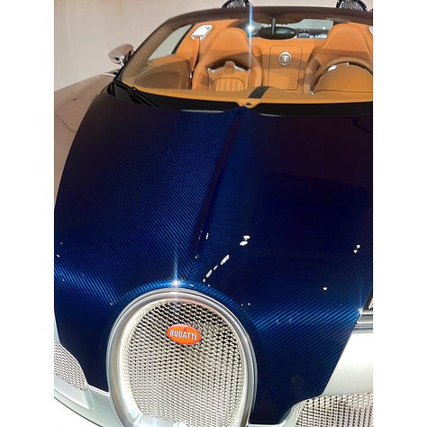 close up photo of Bugatti Veyron carbon fiber laquer finish