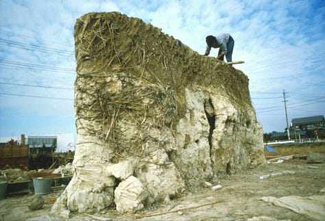 Images of a 10 foot tall clay structure, before, during burning, and after burning