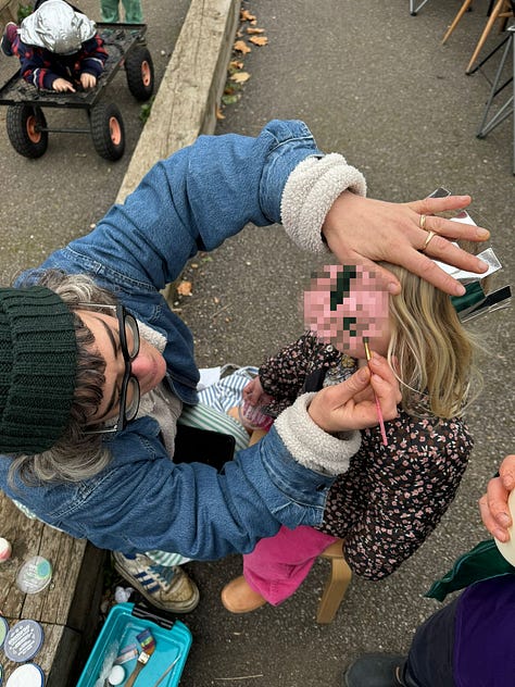 craft table with clay and natural materials, face painting and flower bulbs to plant