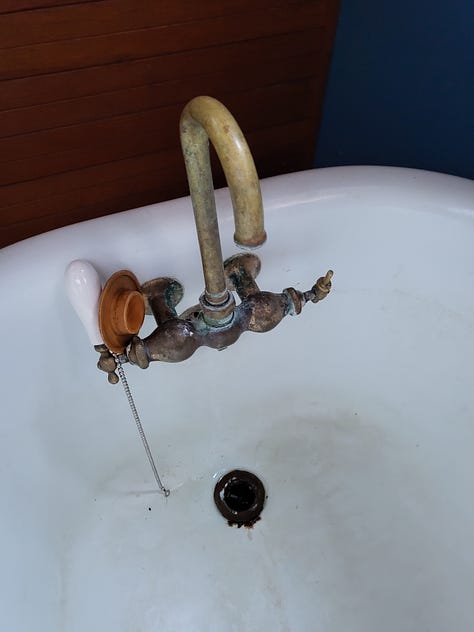 old and new faucets and washing dishes in the tub!