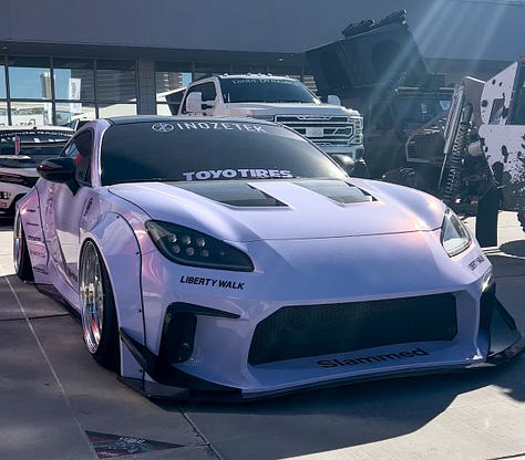 Variations of customized Toyota GR86 models seen at SEMA 2023 in Las Vegas.