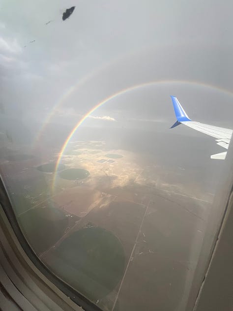 A full-circle double rainbow I saw flying home from California.