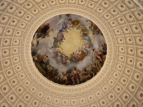 A picture of the U.S. Capitol building, recognizable by its iconic dome and surrounded by trees, likely taken from a garden or park nearby. A close-up of a plate with a waffle, ice cream, and what seems to be a side of strawberries. The plate is ornate, with a traditional blue-and-white pattern and the name "Li'l Louis's" written on it. A detailed view of a fresco or painted ceiling, likely the Apotheosis of Washington, found in the dome of the U.S. Capitol Rotunda.