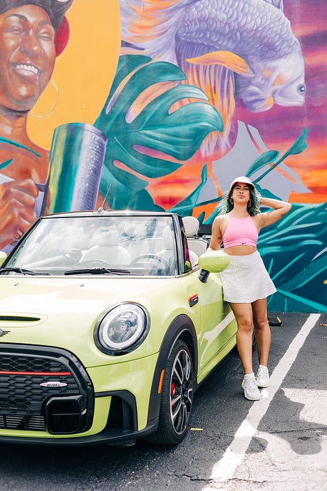Miami editorial photoshoot in wynwood walls with colorful murals lime green mini cooper convertible and fashion model
