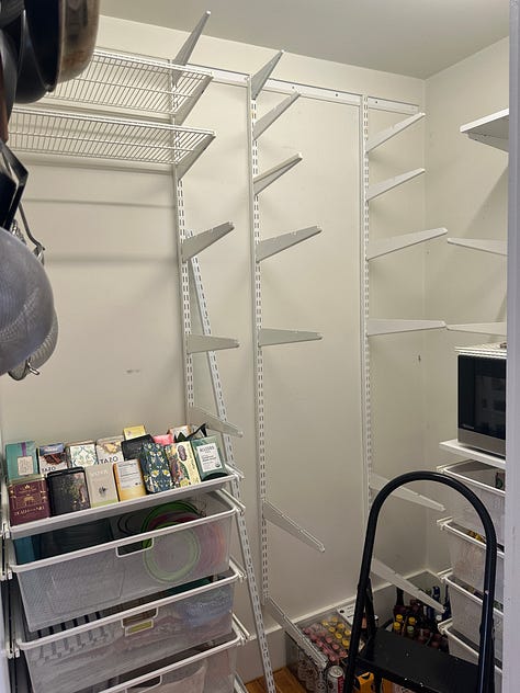 Clearing out the pantry; piles everywhere; the finished pantry