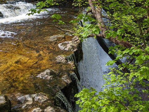 images of waterfalls in sunshine in the brecon beacons