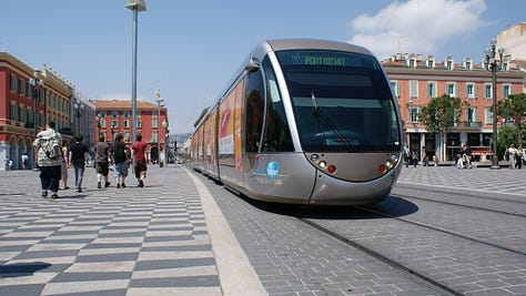 Images of a tram car, a bi-directional cycle path, and a neighbourhood bus