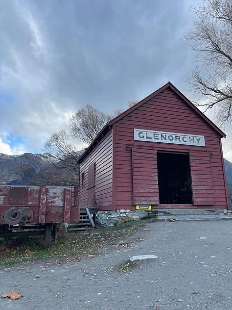 The Famous Glenorchy Boat Shed on the lake, and the mountain range across from it.