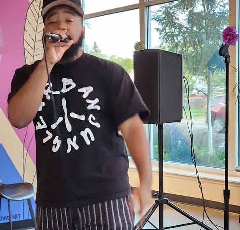 Photos of various artists performing at Flava Coffee & Cafe.