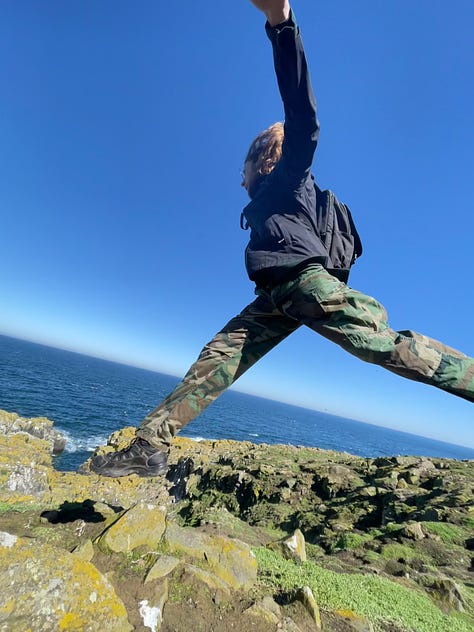Jumping with Scottish scenery