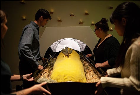 Images of a funeral home in Seattle where remains are composted so that families may bring them home and grow new life.