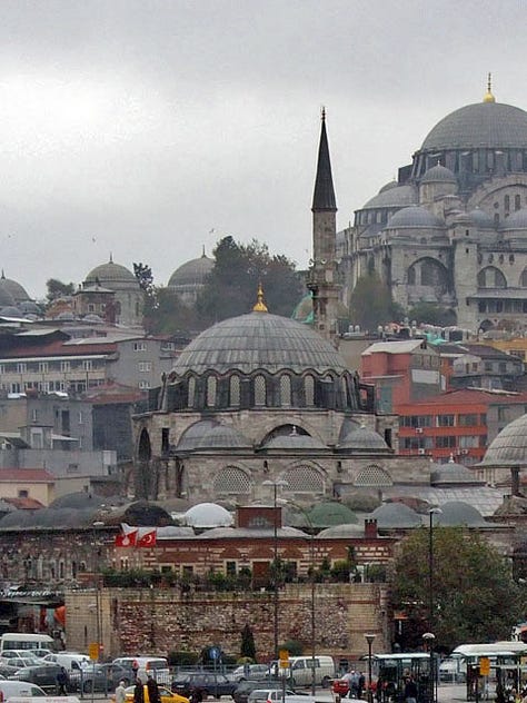 LEFT TO RIGHT: The Rüstem Pasha Mosque (foreground) is dwarfed by the much larger Süleymaniye Mosque; The two small entry doors behind a kebab stand; Shops beneath the mosque.