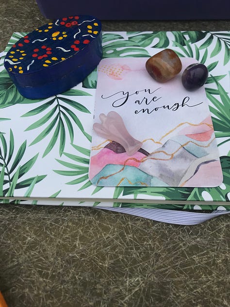 Mountains, fam house window, journal, crystal and card